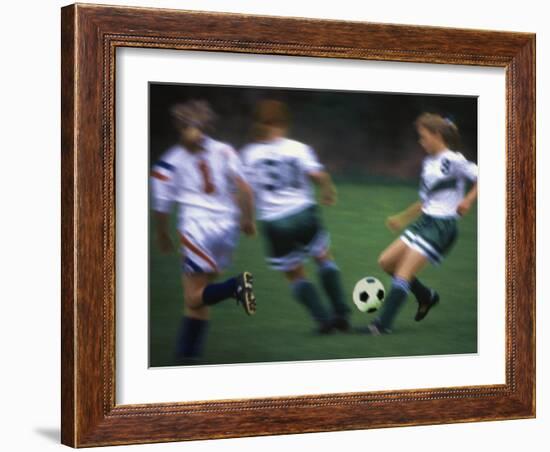 Girls Playing Soccer on a Field-null-Framed Photographic Print