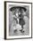 Girls Sharing an Umbrella-Josef Scaylea-Framed Photographic Print