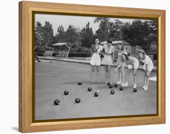 Girls Wait for the Final Bowl Before Adding up the Score-null-Framed Premier Image Canvas