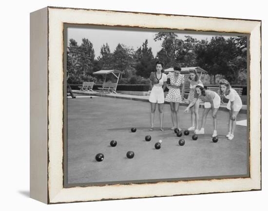 Girls Wait for the Final Bowl Before Adding up the Score-null-Framed Premier Image Canvas