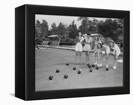 Girls Wait for the Final Bowl Before Adding up the Score-null-Framed Premier Image Canvas