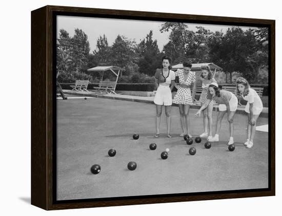 Girls Wait for the Final Bowl Before Adding up the Score-null-Framed Premier Image Canvas