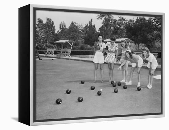 Girls Wait for the Final Bowl Before Adding up the Score-null-Framed Premier Image Canvas