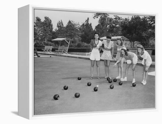 Girls Wait for the Final Bowl Before Adding up the Score-null-Framed Premier Image Canvas