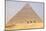 Giza, Cairo, Egypt. Men on camels at the Great Pyramid complex.-Emily Wilson-Mounted Photographic Print