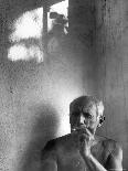 Pablo Picasso, Bare Chested and Smoking Cigarette-Gjon Mili-Premium Photographic Print