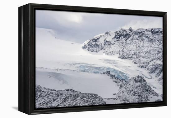 Glacier flowing down a mountain on Elephant Island, South Shetland Islands, Antarctica, Polar Regio-Michael Runkel-Framed Premier Image Canvas