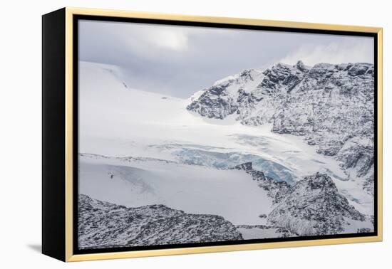 Glacier flowing down a mountain on Elephant Island, South Shetland Islands, Antarctica, Polar Regio-Michael Runkel-Framed Premier Image Canvas