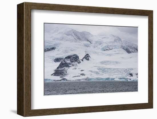 Glacier hanging on the rocks of Coronation Island, South Orkney Islands, Antarctica, Polar Regions-Michael Runkel-Framed Photographic Print