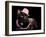 Glamorous Black Cat Wearing Pink Hat And Beads Against Black Background-vitalytitov-Framed Photographic Print