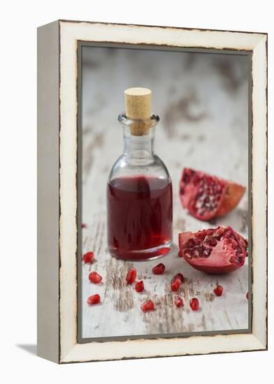 Glass Bottle with Pomegranate Juice and Pomegranate-Jana Ihle-Framed Premier Image Canvas