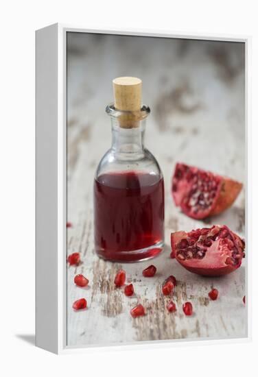 Glass Bottle with Pomegranate Juice and Pomegranate-Jana Ihle-Framed Premier Image Canvas