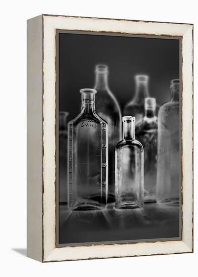 Glass Bottles-Moises Levy-Framed Premier Image Canvas