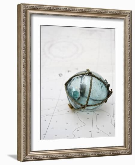 Glass fishing float on chart-Savanah Plank-Framed Photo