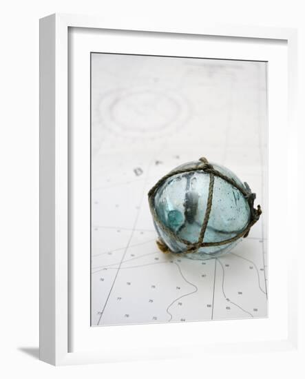 Glass fishing float on chart-Savanah Plank-Framed Photo