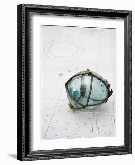 Glass fishing float on chart-Savanah Plank-Framed Photo