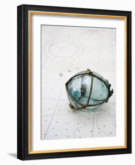 Glass fishing float on chart-Savanah Plank-Framed Photo