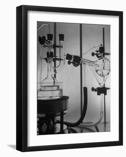 Glass Funnels, Beakers and Retorts Used in Chemical Experiments-null-Framed Photographic Print