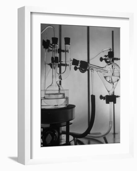 Glass Funnels, Beakers and Retorts Used in Chemical Experiments-null-Framed Photographic Print