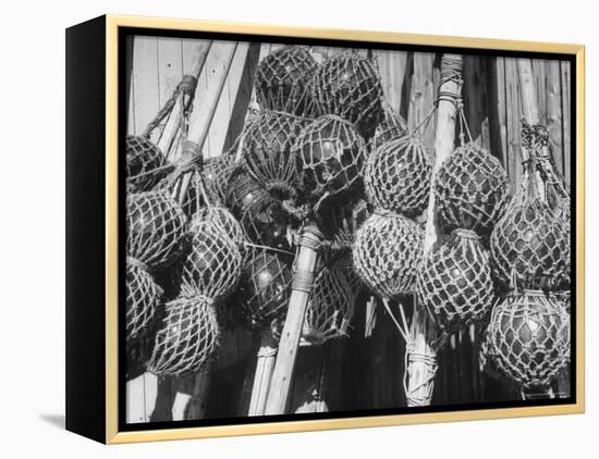 Glass Net Floats Being Used in Groups to Hold Afloat Net Markers Which Are Poles with Small Flag-Eliot Elisofon-Framed Premier Image Canvas