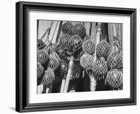 Glass Net Floats Being Used in Groups to Hold Afloat Net Markers Which Are Poles with Small Flag-Eliot Elisofon-Framed Photographic Print