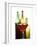 Glass of Red Wine in Front of Three Wine Bottles-Joerg Lehmann-Framed Photographic Print