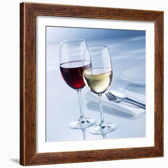 Glass of White Wine and Glass of Red Wine Beside Place-Setting-Alexander Feig-Framed Photographic Print