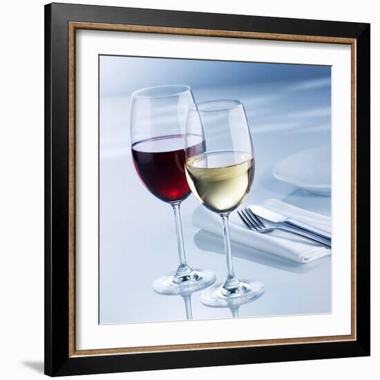 Glass of White Wine and Glass of Red Wine Beside Place-Setting-Alexander Feig-Framed Photographic Print