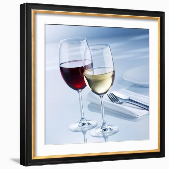 Glass of White Wine and Glass of Red Wine Beside Place-Setting-Alexander Feig-Framed Photographic Print