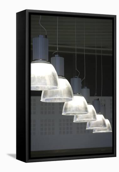 Glass Pendant Lights Hanging in a Row-David Barbour-Framed Stretched Canvas