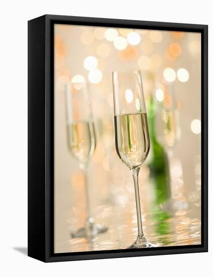 Glasses of Sparkling Wine with Twinkling Lights-Brigitte Protzel-Framed Premier Image Canvas