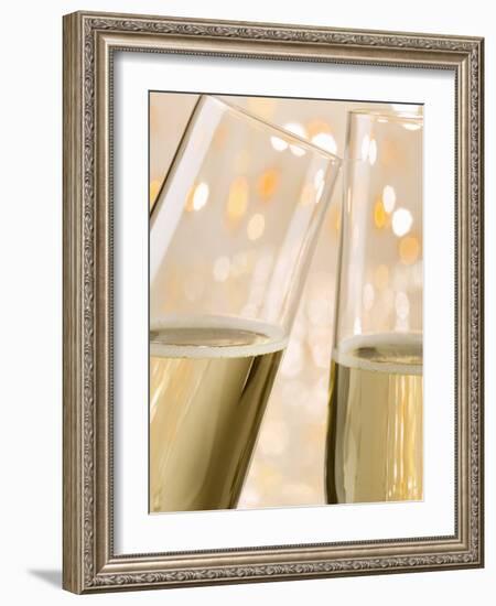 Glasses of Sparkling Wine with Twinkling Lights-Brigitte Protzel-Framed Photographic Print