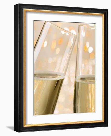 Glasses of Sparkling Wine with Twinkling Lights-Brigitte Protzel-Framed Photographic Print