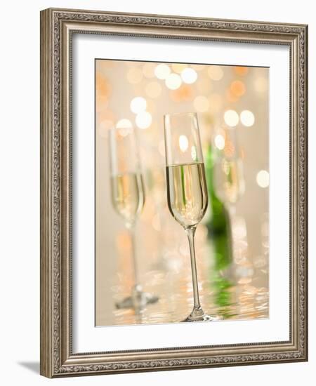 Glasses of Sparkling Wine with Twinkling Lights-Brigitte Protzel-Framed Photographic Print