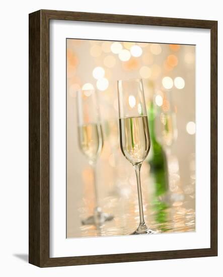 Glasses of Sparkling Wine with Twinkling Lights-Brigitte Protzel-Framed Photographic Print