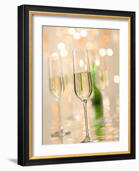 Glasses of Sparkling Wine with Twinkling Lights-Brigitte Protzel-Framed Photographic Print