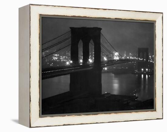 Glittering Night View of the Brooklyn Bridge Spanning the Glassy Waters of the East River-Andreas Feininger-Framed Premier Image Canvas