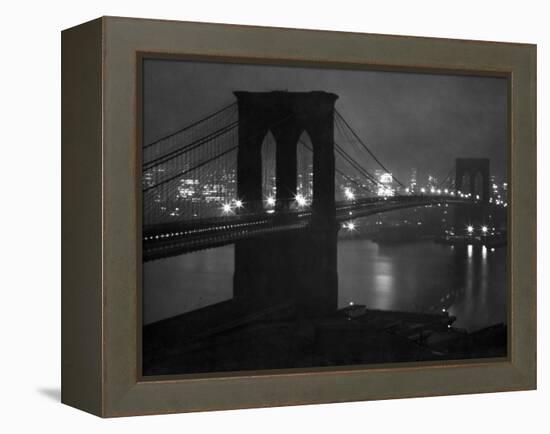 Glittering Night View of the Brooklyn Bridge Spanning the Glassy Waters of the East River-Andreas Feininger-Framed Premier Image Canvas