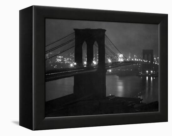 Glittering Night View of the Brooklyn Bridge Spanning the Glassy Waters of the East River-Andreas Feininger-Framed Premier Image Canvas