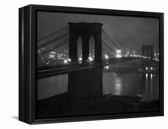 Glittering Night View of the Brooklyn Bridge Spanning the Glassy Waters of the East River-Andreas Feininger-Framed Premier Image Canvas