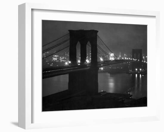 Glittering Night View of the Brooklyn Bridge Spanning the Glassy Waters of the East River-Andreas Feininger-Framed Premium Photographic Print