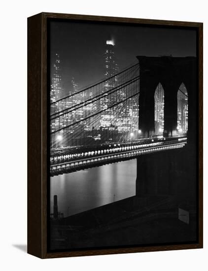 Glittering Night View of the Brooklyn Bridge Spanning the Glassy Waters of the East River-Andreas Feininger-Framed Premier Image Canvas