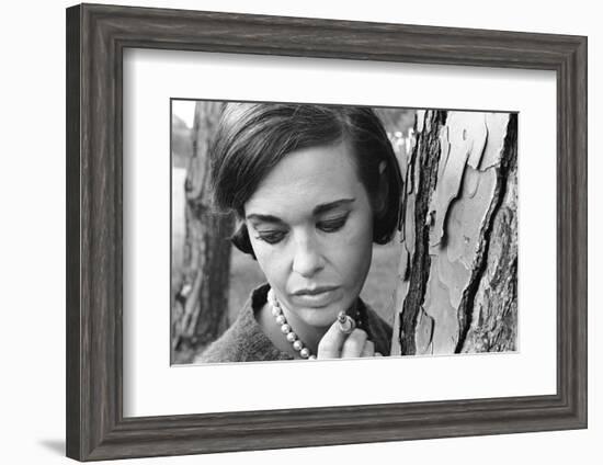 Gloria Vanderbilt Smoking Outside and Showing New Hairdo, 1963-Paul Schutzer-Framed Photographic Print