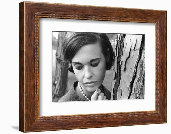 Gloria Vanderbilt Smoking Outside and Showing New Hairdo, 1963-Paul Schutzer-Framed Photographic Print