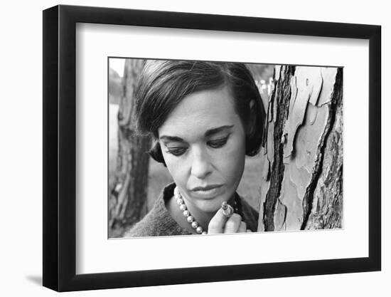 Gloria Vanderbilt Smoking Outside and Showing New Hairdo, 1963-Paul Schutzer-Framed Photographic Print