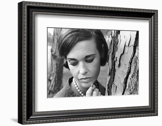 Gloria Vanderbilt Smoking Outside and Showing New Hairdo, 1963-Paul Schutzer-Framed Photographic Print