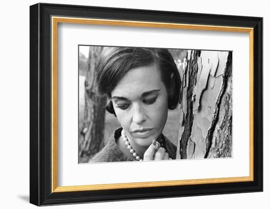 Gloria Vanderbilt Smoking Outside and Showing New Hairdo, 1963-Paul Schutzer-Framed Photographic Print