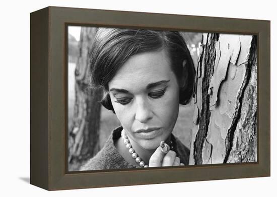 Gloria Vanderbilt Smoking Outside and Showing New Hairdo, 1963-Paul Schutzer-Framed Premier Image Canvas