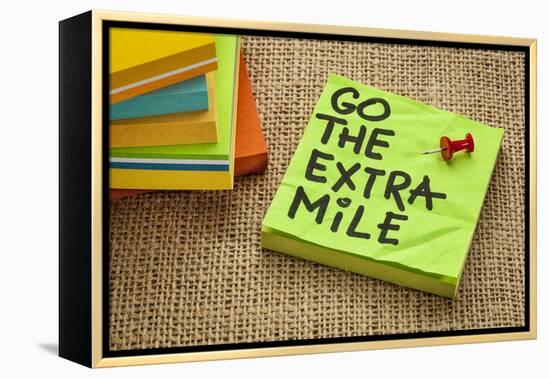 Go the Extra Mile - Motivational Reminder or Procrastination Concept - Handwriting on Sticky Note-PixelsAway-Framed Premier Image Canvas