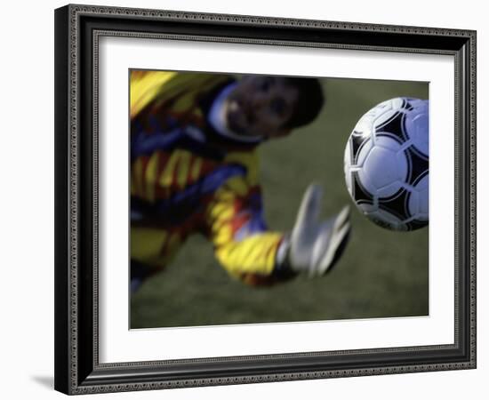 Goalie Attempting to Stop a Soccer Ball-null-Framed Photographic Print